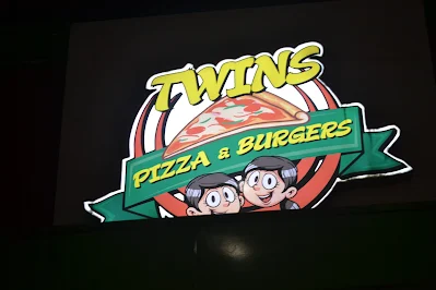 " Twins Pizza burger store sign"