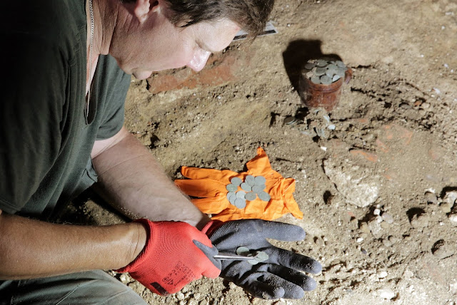 Thousands of 17th century silver coins found buried in Teutonic Knights’ church
