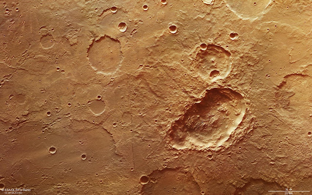 Craters suggest impacting body that may have broken into three before it hit Mars