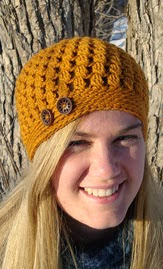 http://www.ravelry.com/patterns/library/in-bloom-beret-and-cap