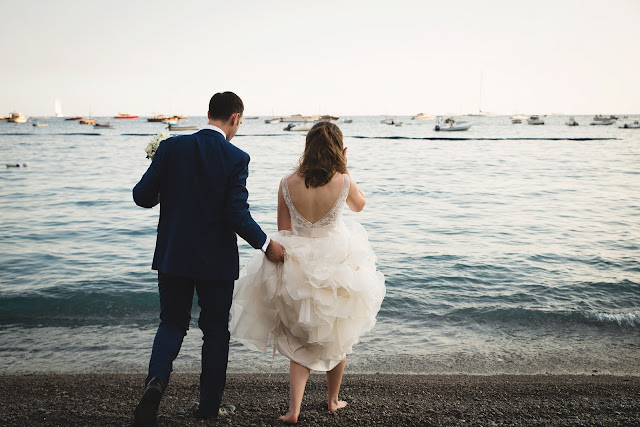 Bride and groom on Positano beach