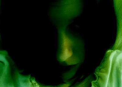 woman in green light