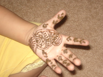 2) my mehandi tattoo Arabic style.