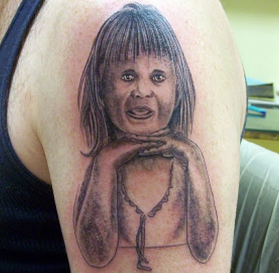 satanic tattoos. C. A satanic doll that can