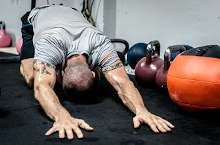 Bodybuilder stretching