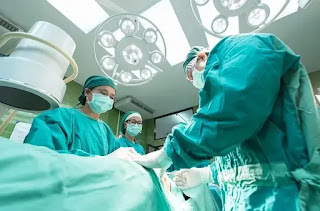 Doctors doing surgery