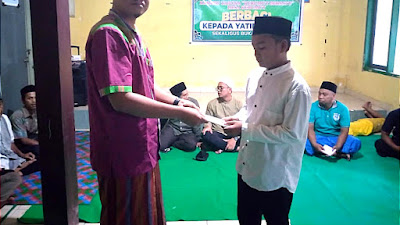 Karang Taruna Desa Kerumut Bersatu Berbagi Rezeki Kepada Puluhan Anak Yatim dan Piatu