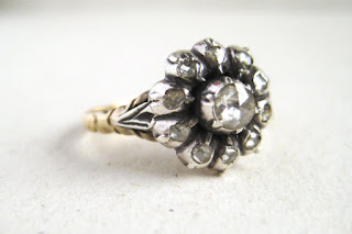 vintage flower shaped engagement ring