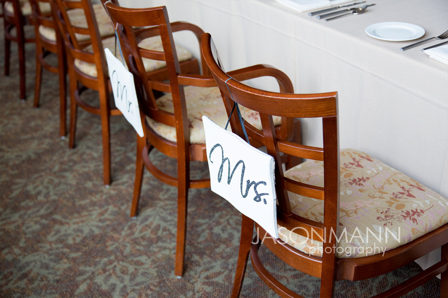 Mr and Mrs wedding reception chairs. Photo by Jason Mann Photography, 920-246-8106, www.jmannphoto.com