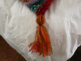 tassel on knitted throw
