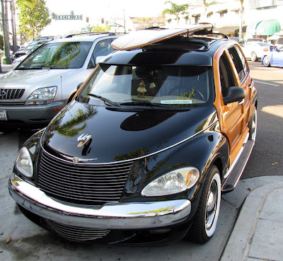 2 of 10 woody custom PT Cruisers made in Riverside