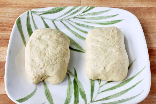 Bolos do Caco dough on a plate.