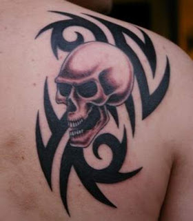 tribal and skull tattoo