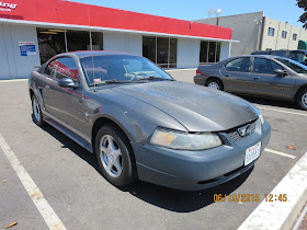 Faded Mustang with peeling paint & dents before repairs & paint at Almost Everything Auto Body