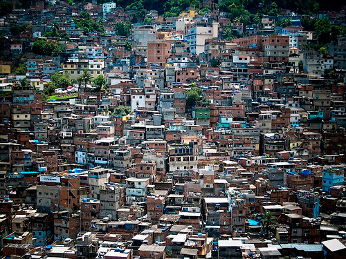 What makes Rocinha a potentially dangerous place to live is the prevalence 