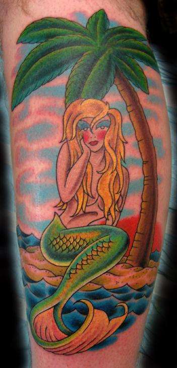 Old School-style mermaid tattoo. Anchors were also popular tattoo motifs at