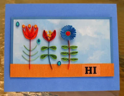 blue quilled card with colorful flowers