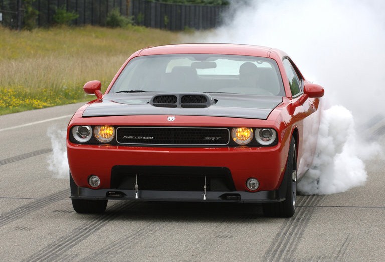  of carbon fiber bucket seats and a big red button to start the monster