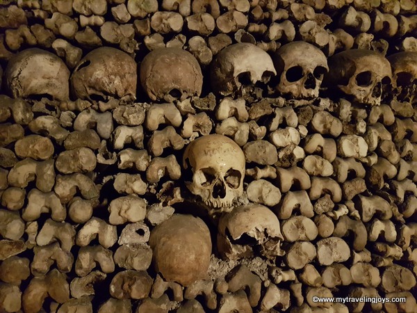 Layers of skulls and bones Catacombs of Paris