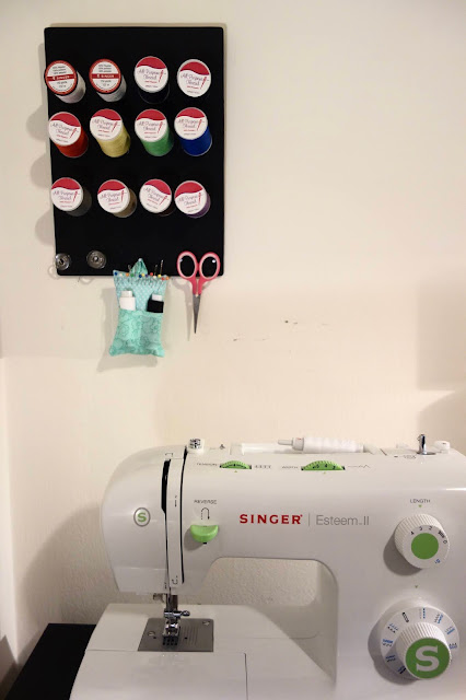 Singer Esteem II sewing machine, sewing nook, home office,thread, spools of thread, Joanns, bobbins, pin cushion, scissors, scrap wood,spool rack, how to make a spool rack, DIY spool rack, thread rack, sewing room, craftroom, sewing machine, how to organize sewing supplies, blah to TADA