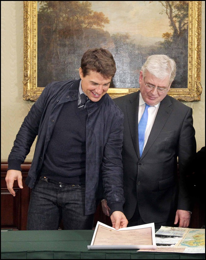  3/4/2013 Tom Cruise Cetificate of Irish Heritage. Picture shows the Tanaiste and Minister for Foreign Affairs, Mr. Eamon Gilmore TD (right) and actor Tom Cruise. Tom is in Dublin today for the premiere of his new movie Oblivion at the Savoy Cinema tonight at 6.30pm. At the reception in Iveagh House, the Tanaiste presented Tom with a Cetificate of Irish Heritage which recognises the depth of Tom's Irish ancestry which stretches back to the 12th century when the Cruise family settled in Ireland as Knights of Strongbow. More recently, new research reveals that the last Irish-born antecedent of Tom was Patrick Russell Cruise who lived in Malahide, Co Dublin, in the early 1800's. Photo: Mark Stedman/Photocall Ireland