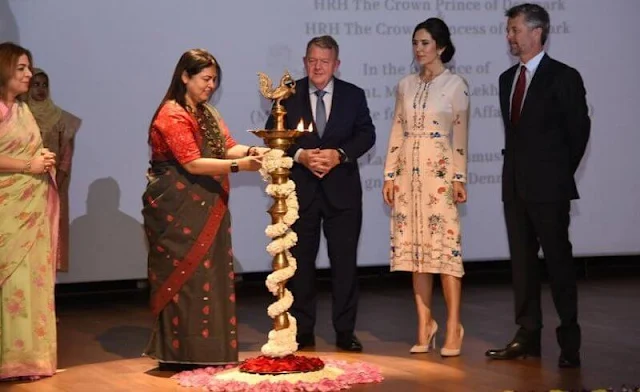 Crown Princess Mary wore a Jerry floral print silk dress by Vilshenko. Raj Ghat monument Mahatma Gandhi