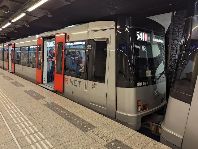 The Amsterdam Metro train with doors open at the station