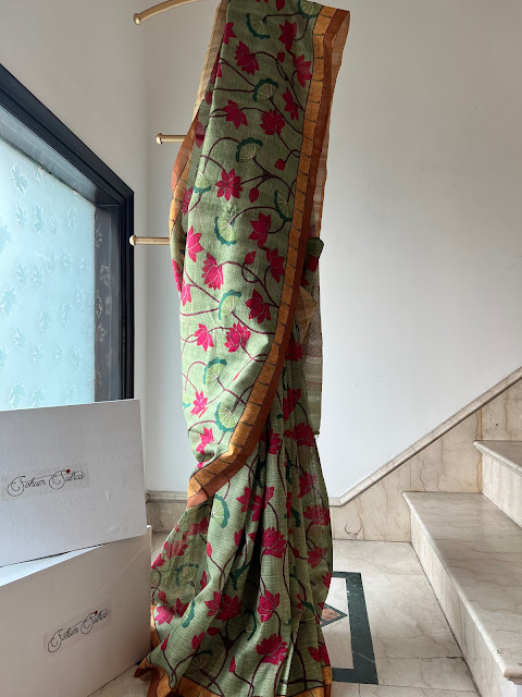 Sage green tussar digital pichwai print kota doria saree with a muniya border