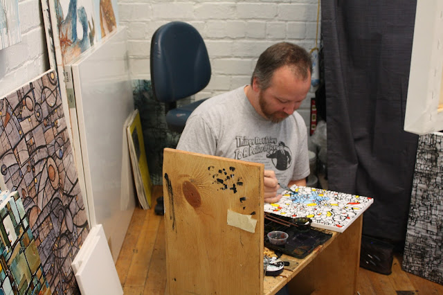 Painter Dan Johnson creating in his studio at The Bucktown Center