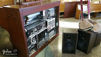 Rear view of Allen organ and HR-100 speakers during installation