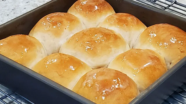 A pan of dinner rolls.