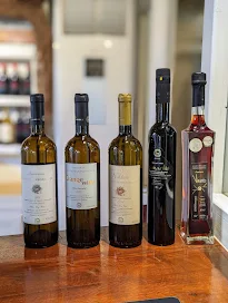 Wine bottles in the tasting room at the Santorini Wine Museum