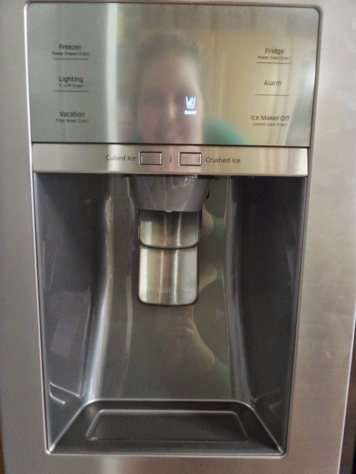 Ice and Water Dispenser in Samsung Showcase Fridge Freezer