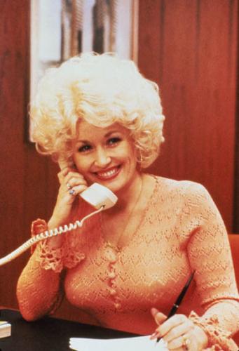 Dolly Parton's knit dresses tight sweaters circle skirts and waist 