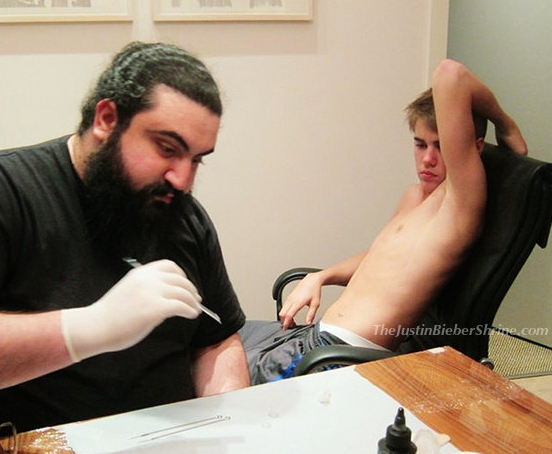 A father and son tattoo bonding session Cute Via JustinBieberShrine