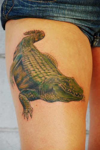 Big Alligator tattoo on thigh.