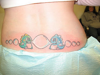 Funny Lower back Tattoo Design