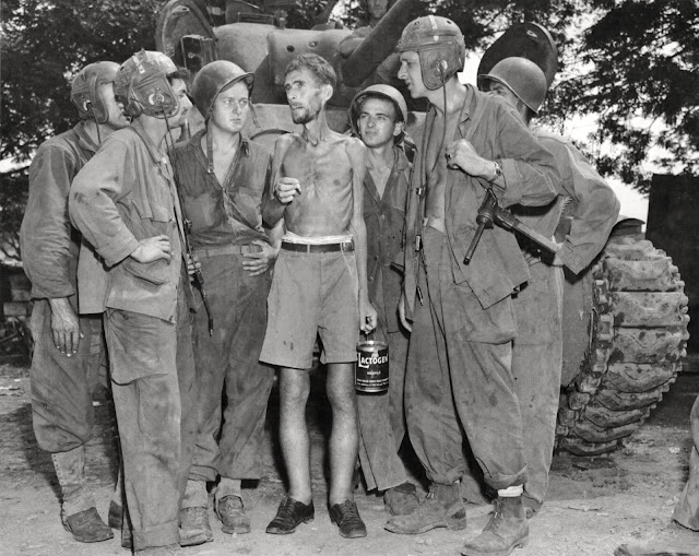 Sto. Tomas, Manila, Philippines - Bernard Herzog (US citizen) and American tank crews WWII