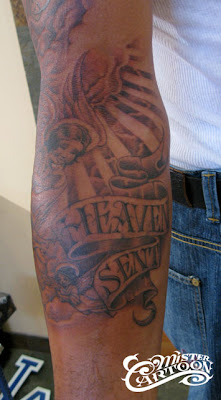 Carlos Boozer by him Tattoos