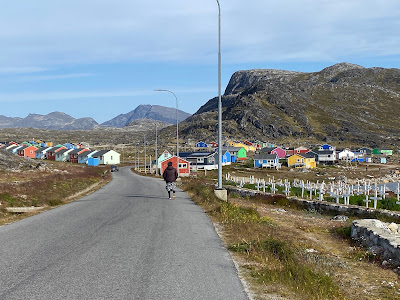 colorful homes near cemetery in Nanortalik Greenland
