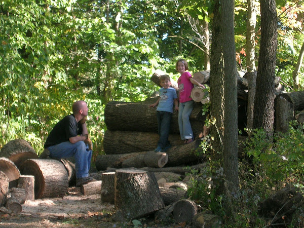 Rob & the kids after cutting, splitting, & stacking wood