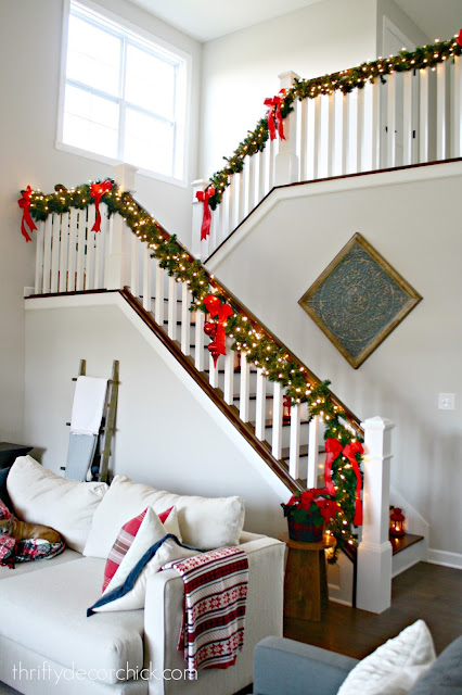 Open staircase with landing at Christmas