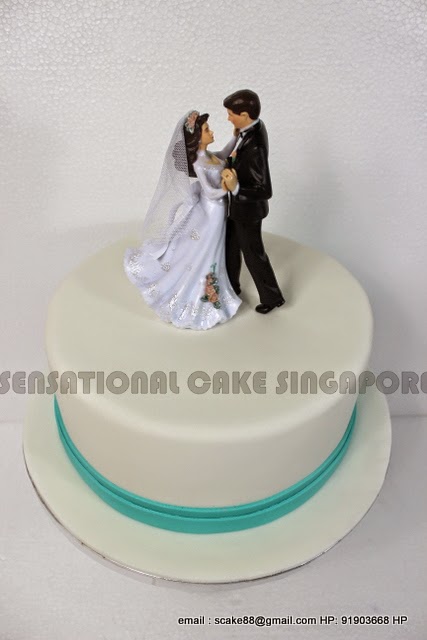The Sensational Cakes  ELEGANT WHITE WEDDING  CAKE  BLUE 