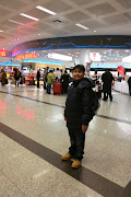 At Istanbul Atatürk Airport. Shafiq posing for Mommy while Daddy went to get . (cimg )