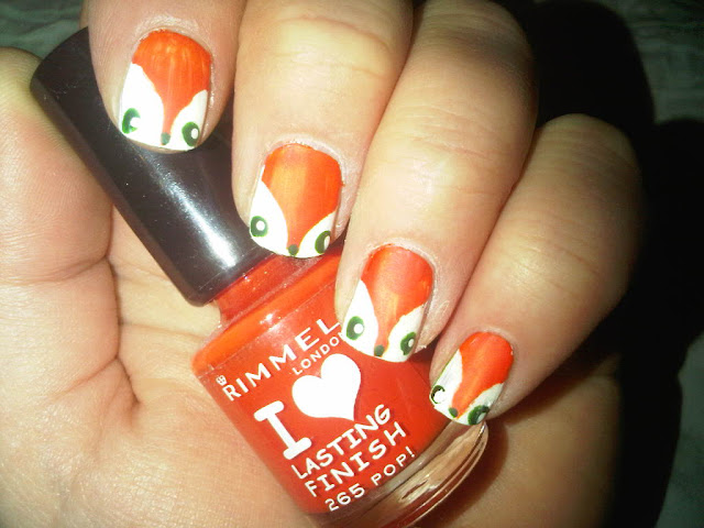 Orange and white foxy nailart