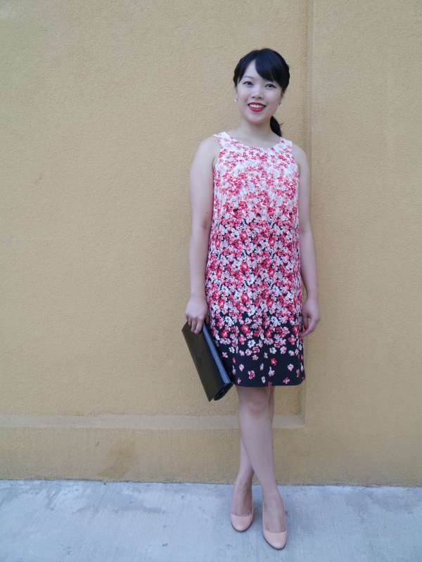 Vancouver fashion blogger Lisa Wong of the blog Solo Lisa wears a cherry blossom print dress from JACOB, nude patent wedges from J. Crew, and a Saint Laurent black patent clutch. She finishes off the look with red lips courtesy of Givenchy Le Rouge and Chanel, and sparkly neon red nails courtesy of Dior nail lacquer.