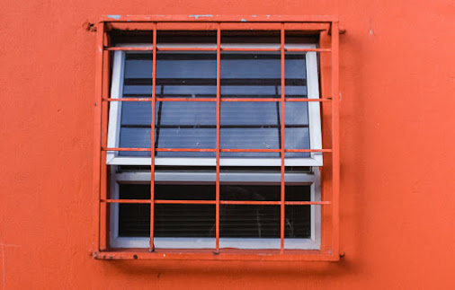 Window with bars (thanks to Sincerely Media for sharing their work on Unsplash)