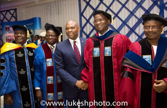 Fashola And His Son At His Honorary Degree Conferment Ceremony At Babcock Uni Yesterday