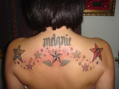 This retro lower back tattoo design uses a popular star style with some