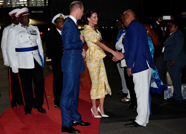 Prince William attended a departure ceremony in Nassau. Kate Middleton wore a floral peplum midi silk dress by Alessandra Rich